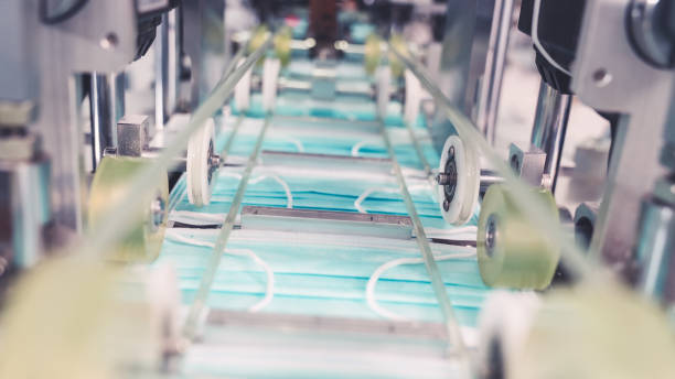 istock Face mask production line in modern factory 1276628027