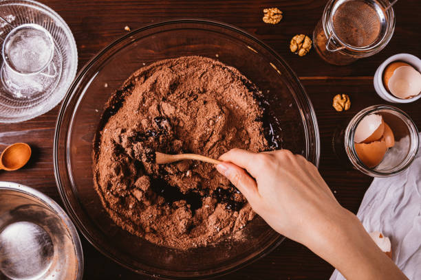 istock Mixing melted chocolate and cocoa powder in large bowl 1276628205