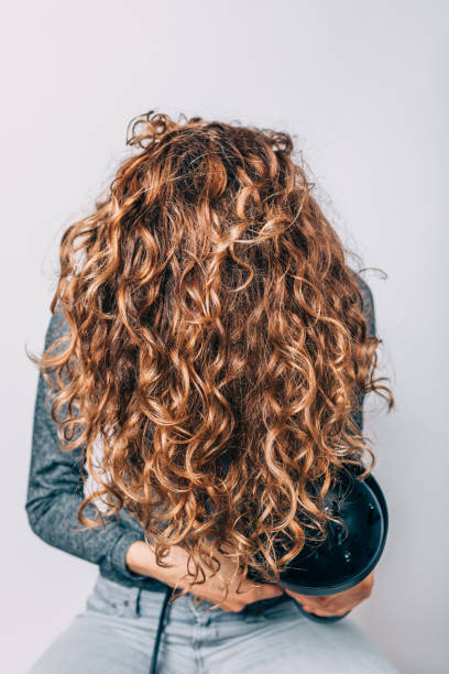 Curly Blow Dry Stock Photos, Pictures & Royalty-Free Images - iStock