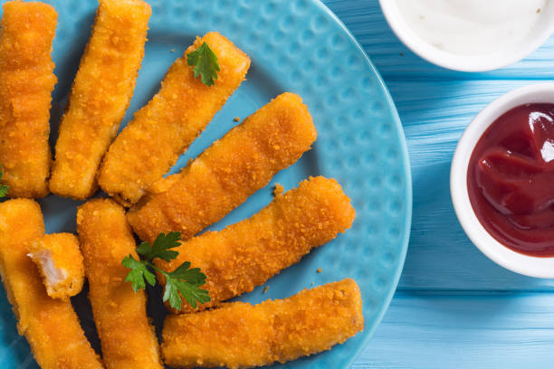 istock Fried fish sticks ( fingers ) or chicken nugget 1276628965