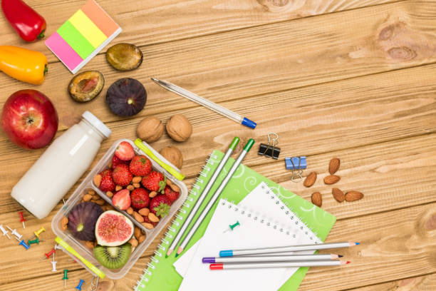 istock Nutritious lunch box made of fruits, berries and nuts. 1276629010