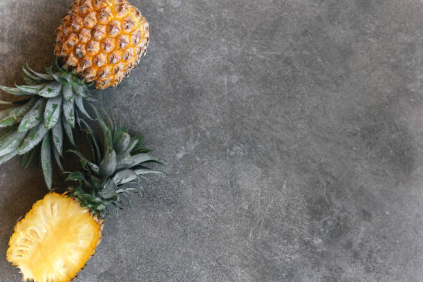 istock Pineapple on a stone table. Tropical Fruits. 1276629673
