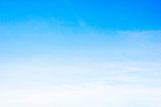 istock Blue sky background and white clouds soft focus, and copy space 1276631232