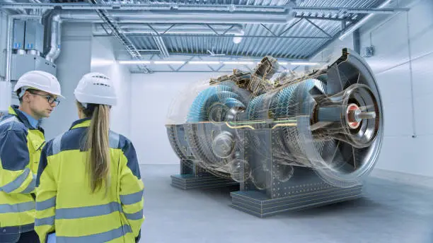 Industry 4.0: Two Engineers Standing, Talking in Factory Workshop with Augmented Reality 3D Turbine Engine, Analysing Components, Fuel Use Efficiency. VFX Special Visual Effects and Graphics