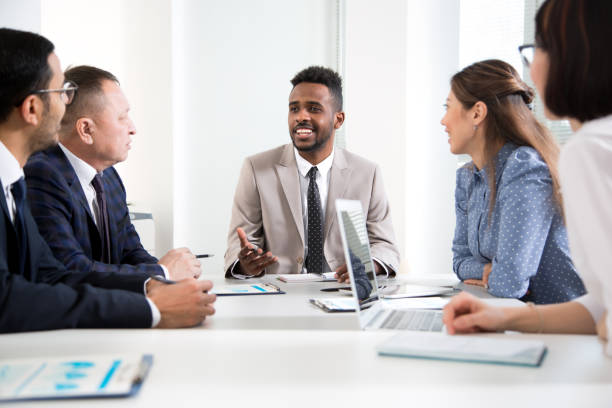 istock Multy-ethnic group of business people working at office 1276633433