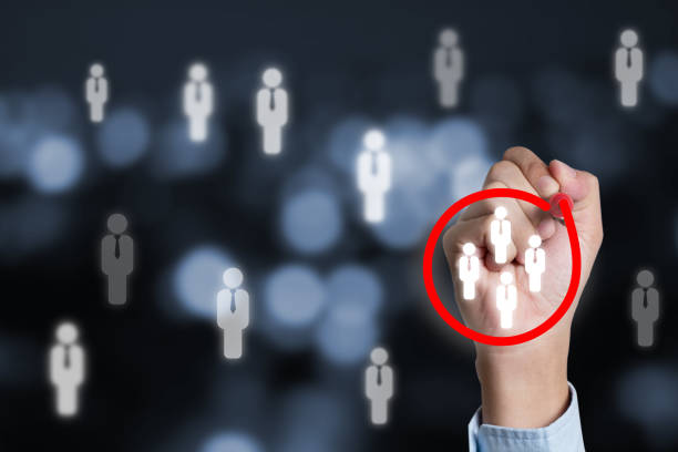 Marketing target audience concept , Businessman writing red circle to mark to focus customer group. Marketing target audience concept , Businessman writing red circle to mark to focus customer group. niche photos stock pictures, royalty-free photos & images