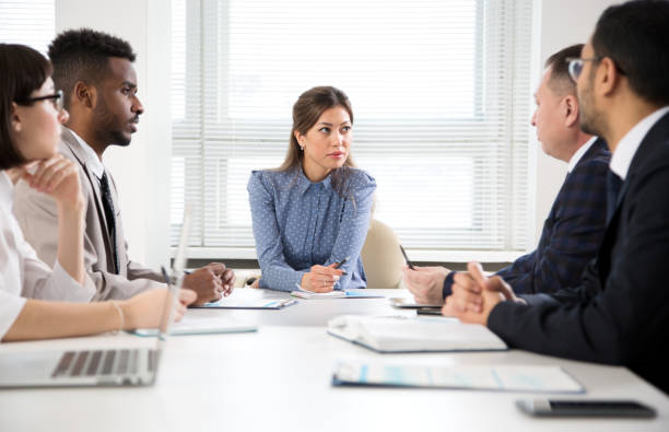 istock Multy-ethnic group of business people working with computer at office 1276635272