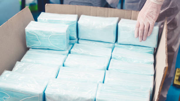 istock Face mask production line in modern factory 1276638280