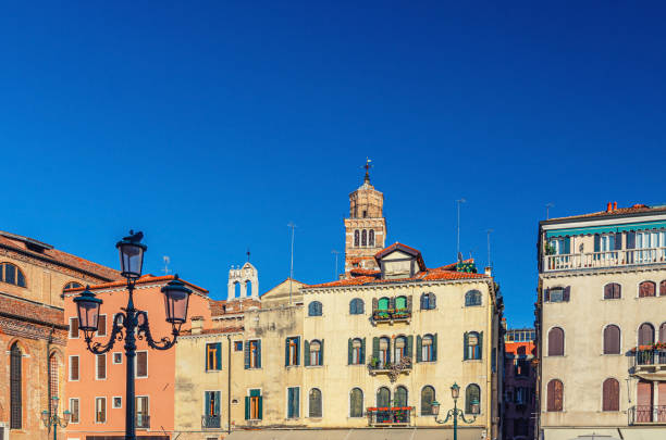 campo santo stefano square with typical italian buildings of venetian architecture - stefano imagens e fotografias de stock