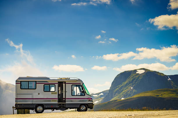 istock Camper car on roadside in norwegian mountains 1276642774