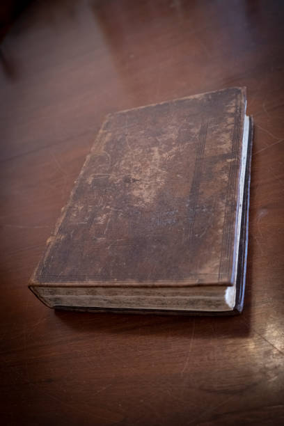 istock Old book from 18th. century on the table 1276648333