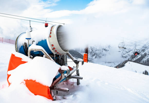 A snow machine in use at an Austrian ski resort in the European Alps, producing fresh snow.
