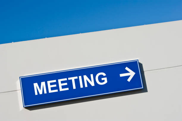 istock Meeting sign and blue background 1276652766