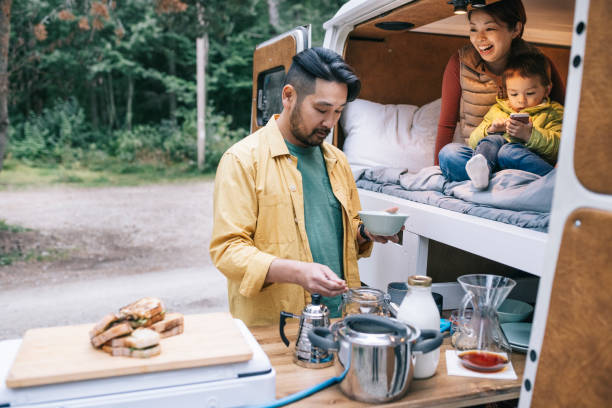 istock Man making breakfast for family 1276653991