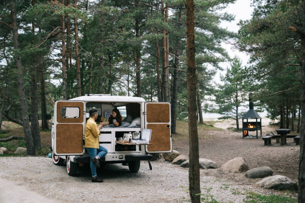 istock Family in nature with their camper van 1276654076