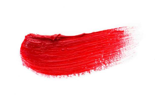 istock Lipstick smear smudge swatch isolated on white background. Cream makeup texture. Bright red color cosmetic product brush stroke swipe sample 1276654181