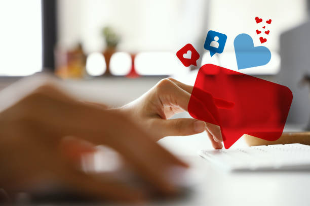 istock Female hands typing on a white computer keyboard with message icons 1276655121