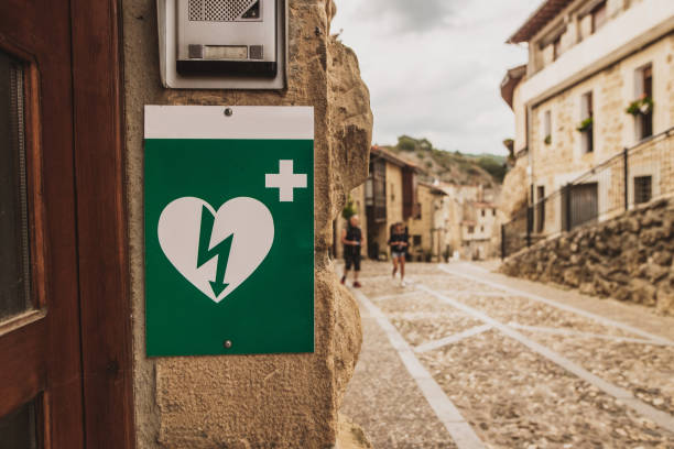 istock Automated External Defibrillator sign in a street 1276656073