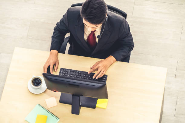 istock Business people wearing headset shot from top view 1276660430