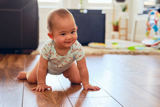 istock Japanese American Baby Learning to Crawl 1276664628