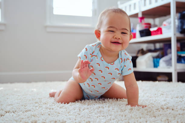 istock Japanese American Baby Learning to Crawl 1276664636
