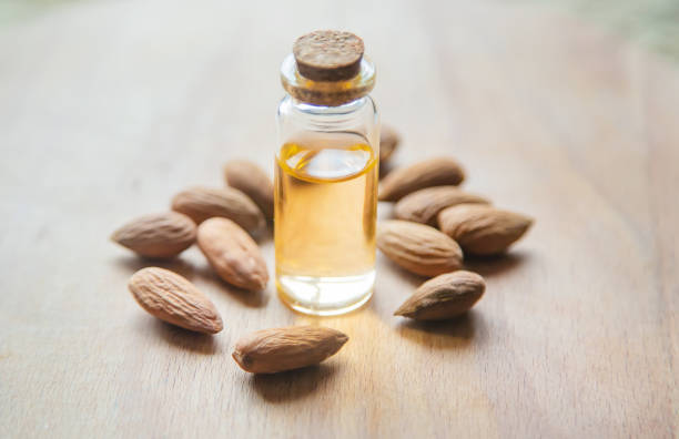 istock Almond essential oil in a small bottle. Selective focus. 1276667051