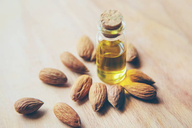 istock Almond essential oil in a small bottle. Selective focus. 1276667056