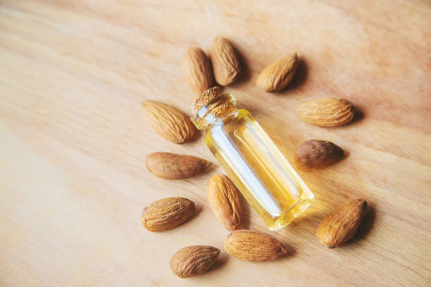 istock Almond essential oil in a small bottle. Selective focus. 1276667062