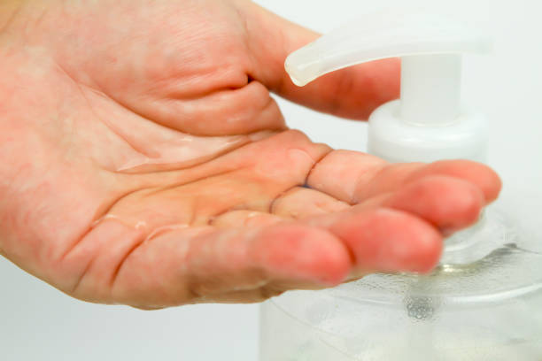 istock Hydroalcoholic gel bottle pouring gel into a hand 1276667399