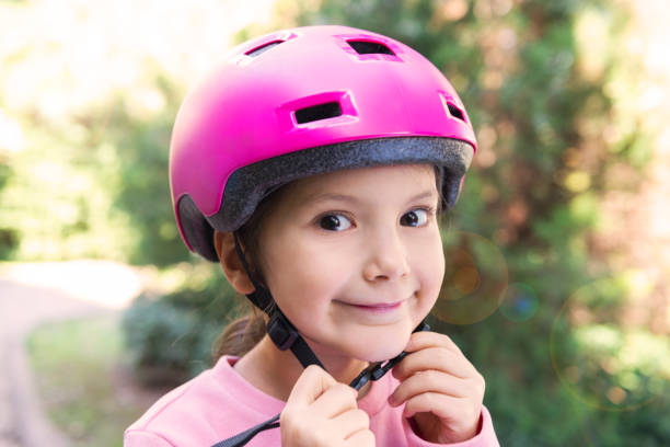 istock Girl With Bicycle Helmet 1276668912