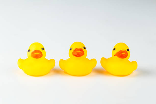 istock Yellow rubber duck isolated on white 1276668914