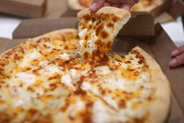 Leftover pizza in box