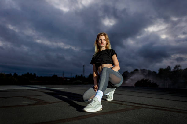 istock Female fitness Trainer exercising 1276672748