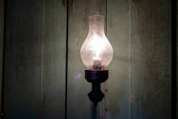 istock An old lamp on a wooden wall 1276674993