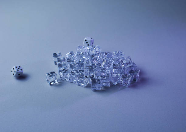 istock Set of ice cubes and dice falling on them, 1276676203