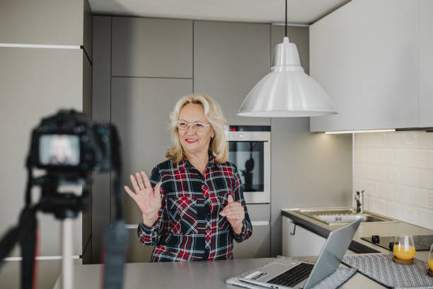 istock Senior woman vlogging 1276678375