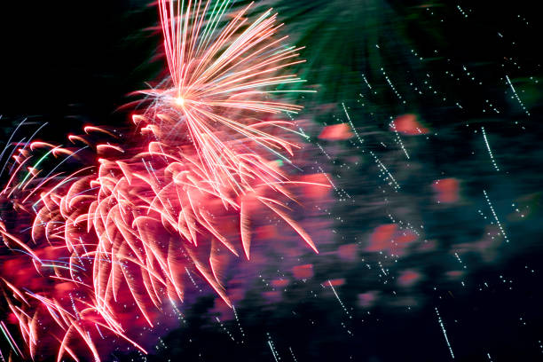 istock Red fireworks and smog, black night sky background 1276681788