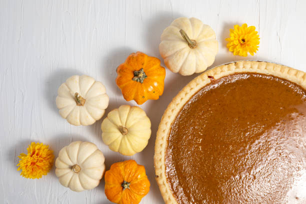 istock Pumpkin pie composition, thanksgiving, white for copy, horizontal poster 1276686417