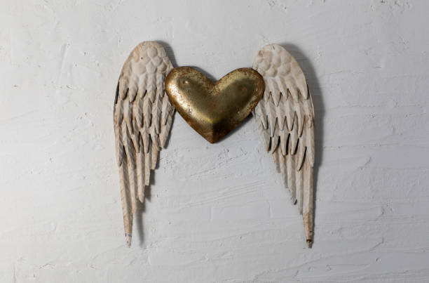 istock Craft made heart with wings, golden 1276687044
