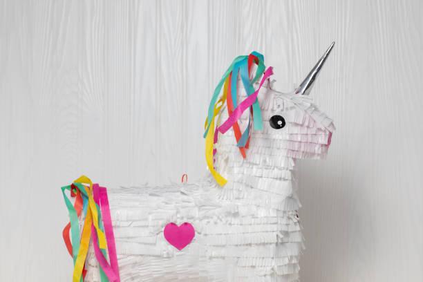 istock White and rainbow unicorn pinata, white background 1276687123