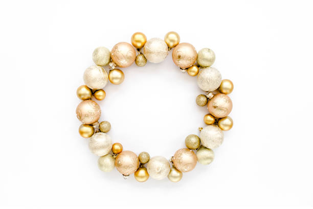 istock Holiday round frame, pattern made and gold glass Christmas balls isolated on a white background. Merry Christmas. The apartment lay, top view 1276687419