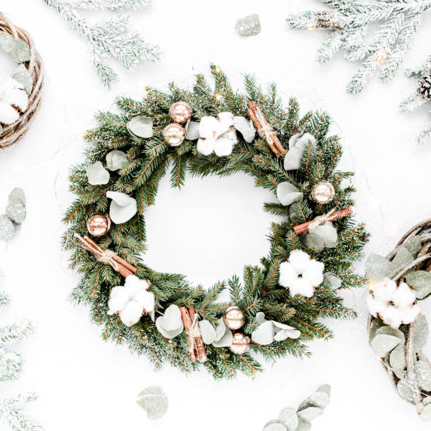 istock Wreath frame and wreath from vine and eucalyptus branch on white background. Flat lay, top view holiday decoration concept. Christmas composition 1276690181
