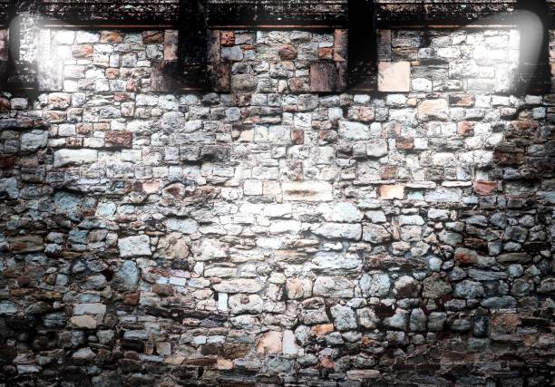 istock Aged and weathered brick wall textures with very bright spotlight illumination 1276697646