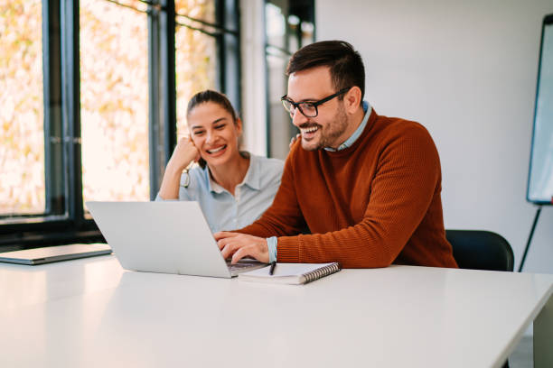 istock Happy business people working together 1276697674