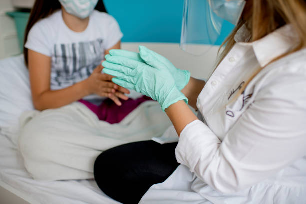 istock Medical worker visiting patient at home 1276697774