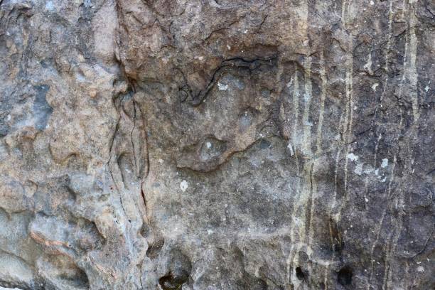 istock Close up view at a granite and stone wall texture in a high resolution. 1276697827