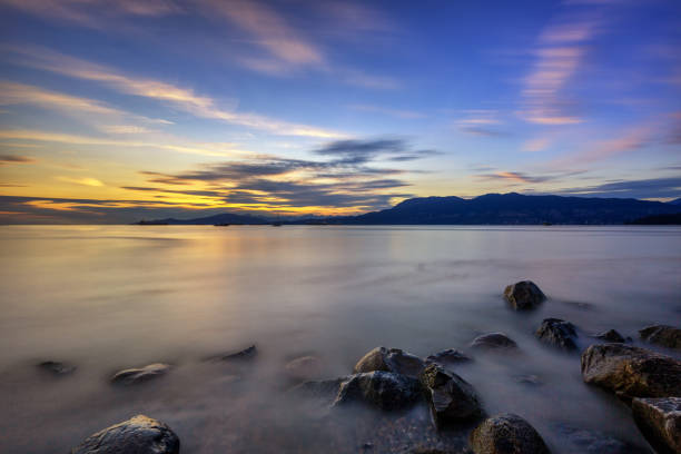 istock beach at sunset glow with long exposure 1276697868
