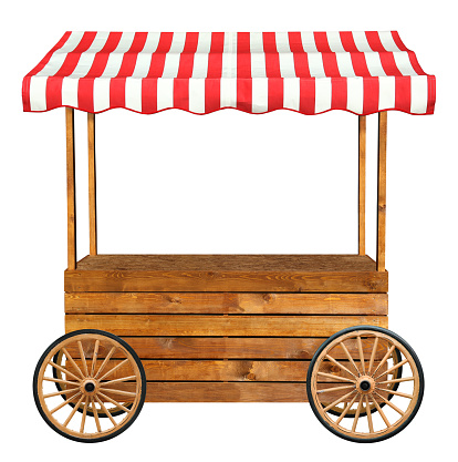 This is an empty wooden stall stand with wheels and red white awning.