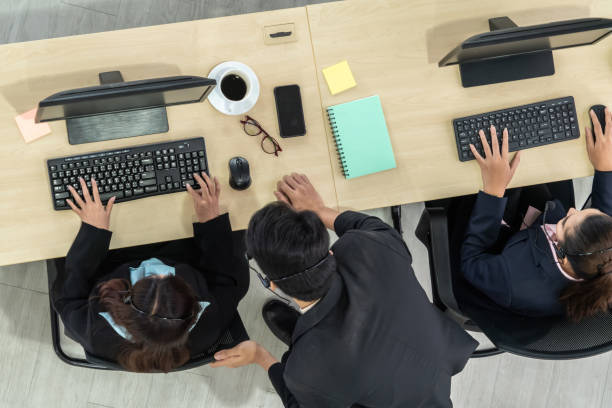 istock Business people wearing headset shot from top view 1276702125