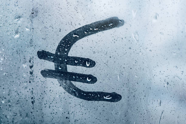 istock Euro money sign on misted window close up 1276702435